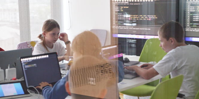 The banner shows children programming during the Kids Coding Camp at Schibsted Tech Polska